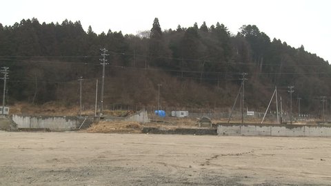 One year on, empty plots of land in town devastated by tsunami in Rikuzentakata, Japan.