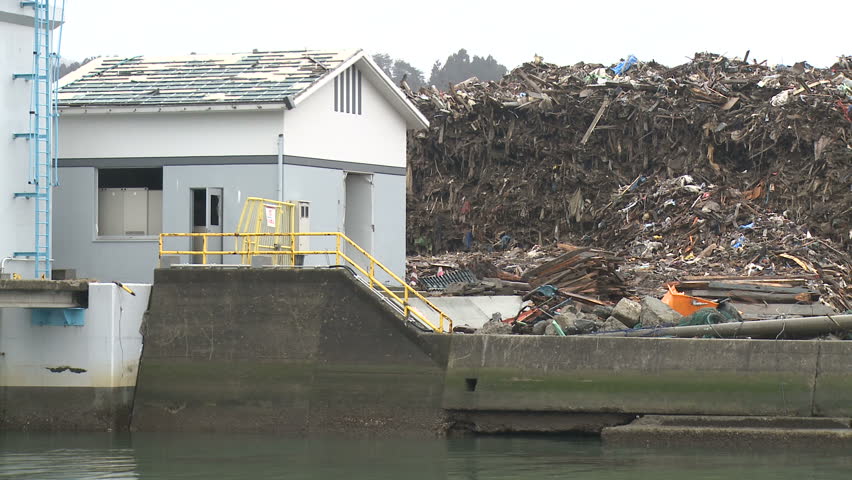 Japan Tsunami 1 Year On - Massive Pile Of Tsunami Debris. As the clean up