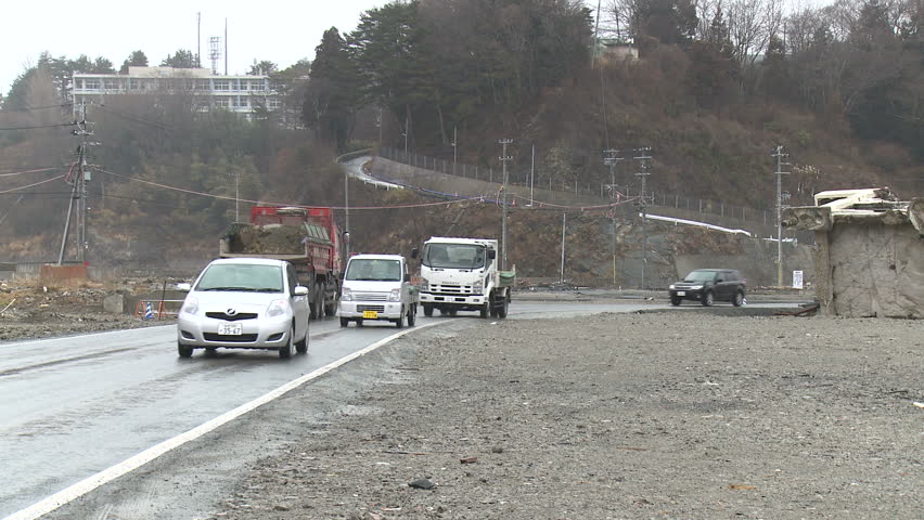 SHIZUGAWA, JAPAN - CIRCA MARCH 2012: Tsunami disaster one year on, traffic