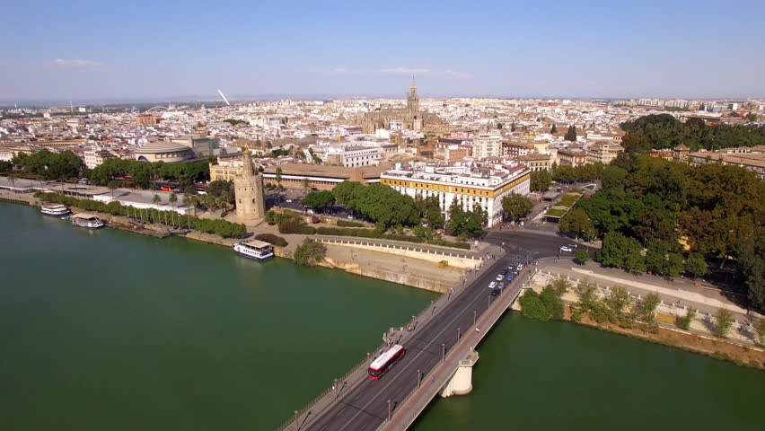 Aerial view of Seville cityscape including the cathedral and Torre del Oro in Sevilla, Andalusia, Spain.
