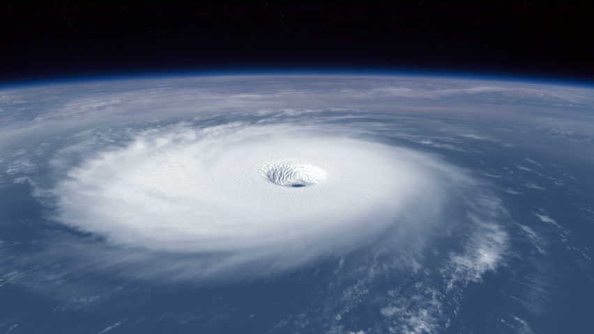 Hurricane: A large ominous hurricane rotating as seen from the International