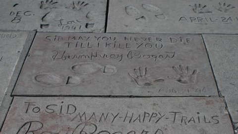 HOLLYWOOD, CA - CIRCA 2011: Humphrey Bogart's hand and footprints at Grauman's Chinese Theater on Hollywood Boulevard in Hollywood, California.