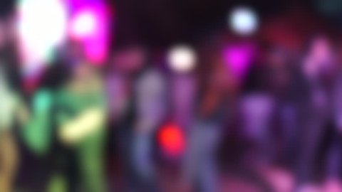 Blurred background of concert goers.