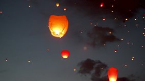 Red heart-shaped chinese lantern in the night sky. Footage. A large group of chinese flying lanterns. - Powered by Shutterstock - Get 15% off with code: PIKWIZARD15
