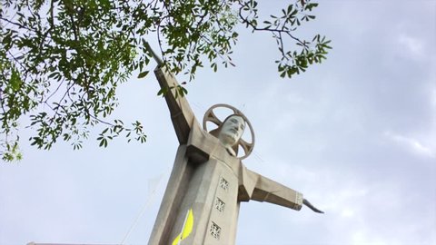 Low angle rotate view of statue of Jesus Christ at Vung Tau city