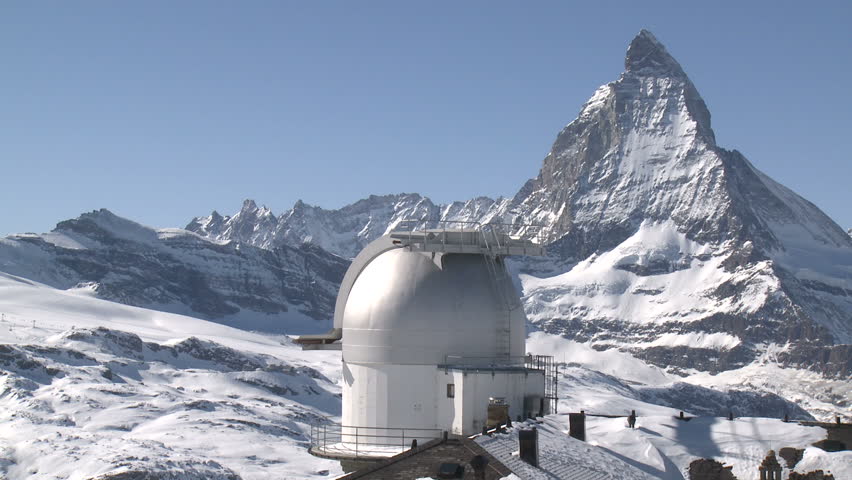 Astronomy Telescope High In Mountains. Shot with the Matterhorn in the