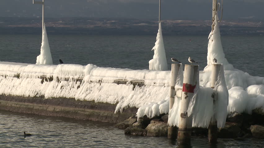 Extreme Ice On Shore Of Lake Geneva. Thick ice coats the shore of Lake Geneva