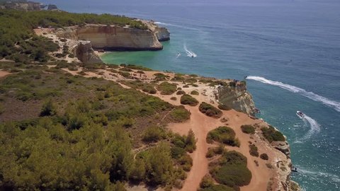 Aerial shot of Praia de Benagil and sea cave, Algarve, Portugal