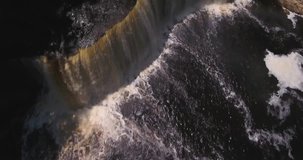 4k Video flying backwards above Tahquamenon falls in northern Michigan 3