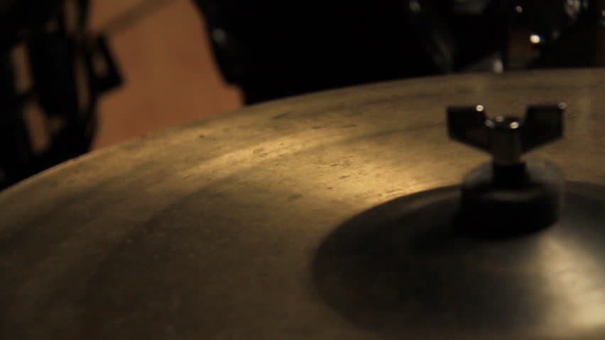 Drumkit 1 Ride Cymbal. Drums being played with the focus on the ride cymbal.
