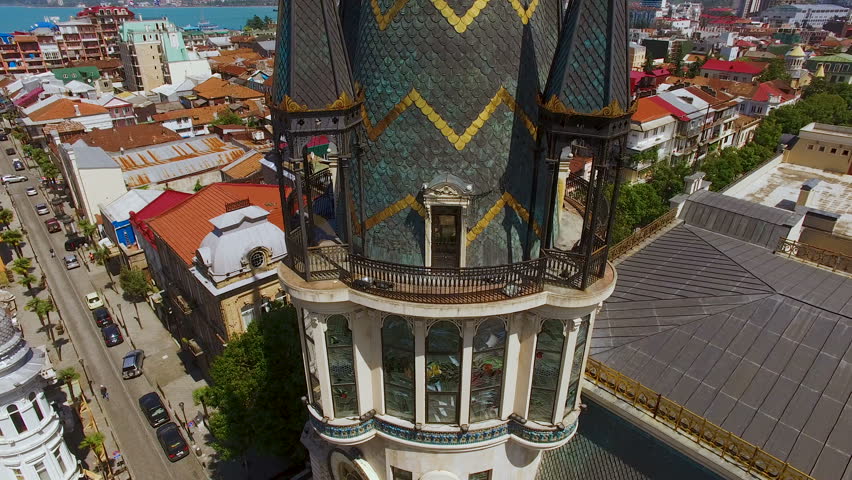 Observation deck of Astronomical clock tower in Batumi against Europe Square