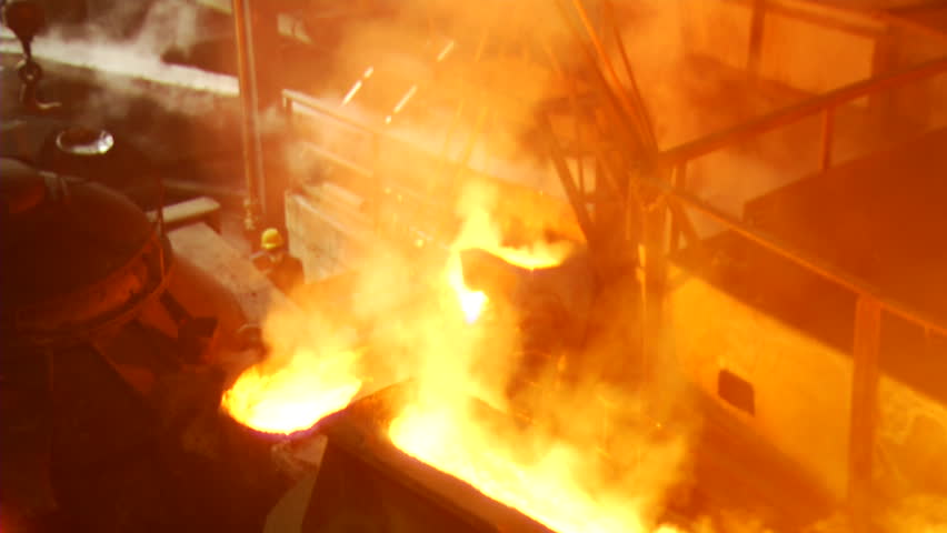 Liquid iron in metallurgy factory. Steelworks. Sequence. 
