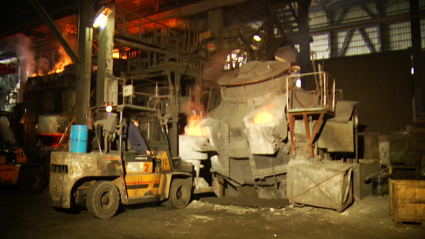Liquid iron in metallurgy factory. Steelworks.