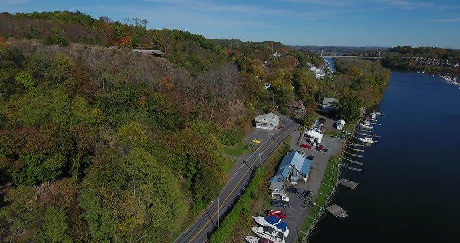 A fire truck drives along a creek in upstate New York. 