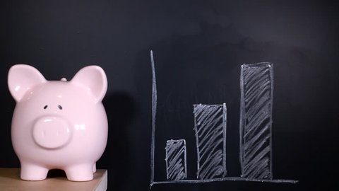 Savings. graph drawn on a chalkboard by financial expert