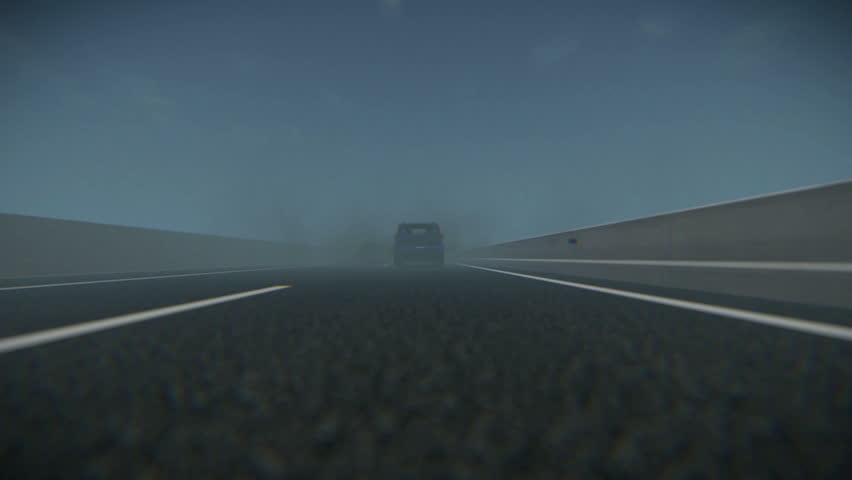 Car running on a highway and fog
