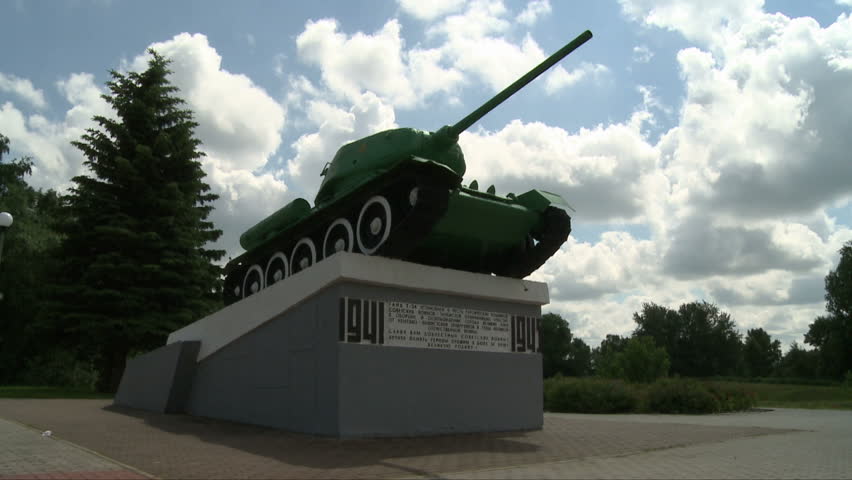 War tank monument in summer city park view
