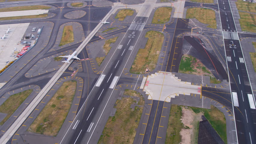 Aerial view planes taxiing on runways towards take off Newark International Airport, North America