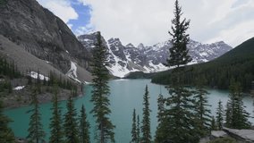 4K Time lapse at Moraine lake in Banff national park, Alberta, Canada
Beautiful view of the Valley of the ten peaks, snowcapped mountains and clouds
Nature environment travel wilderness area concept