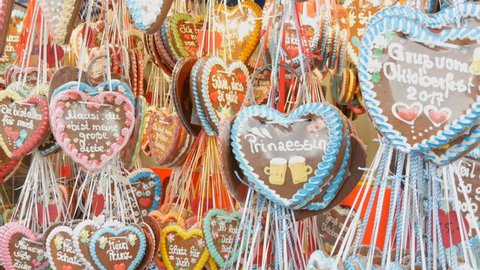 September 17, 2017 - Oktoberfest, Munich, Germany: Many multicolored gingerbread decorations are hung on Theresienwiese in Bavaria, at a beer festival Video stock