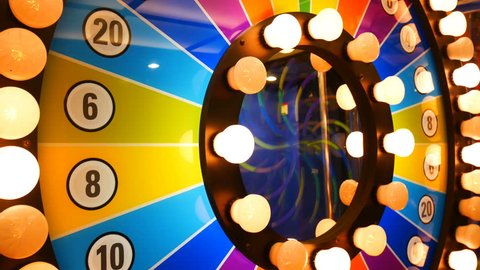 4K footage loop. retro colorful casino game cabinet flashing lights. game spinning light with bankrupt, success and fresh start slots. slot machine gamble footage background