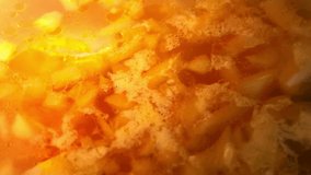 The surface of the boiling vegetable broth. Full HD video.