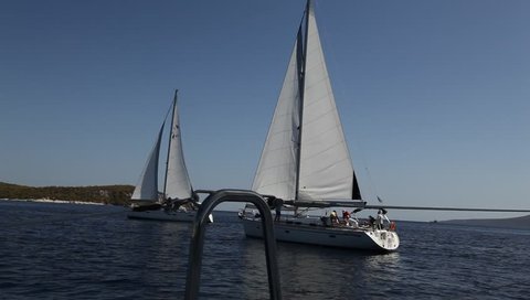 SARONIC GULF,  GREECE - SEPTEMBER 23: Boats competitors during of sailing regatta "Viva Greece 2012" on September 23, 2012 on Saronic Gulf,  Greece. 