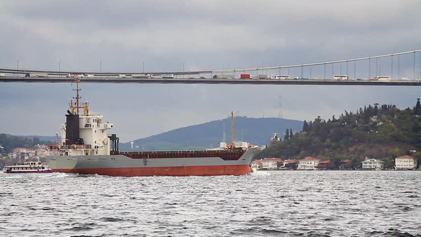 Bosporus Sea traffic with a cargo ship in Istanbul, Turkey. Transportation