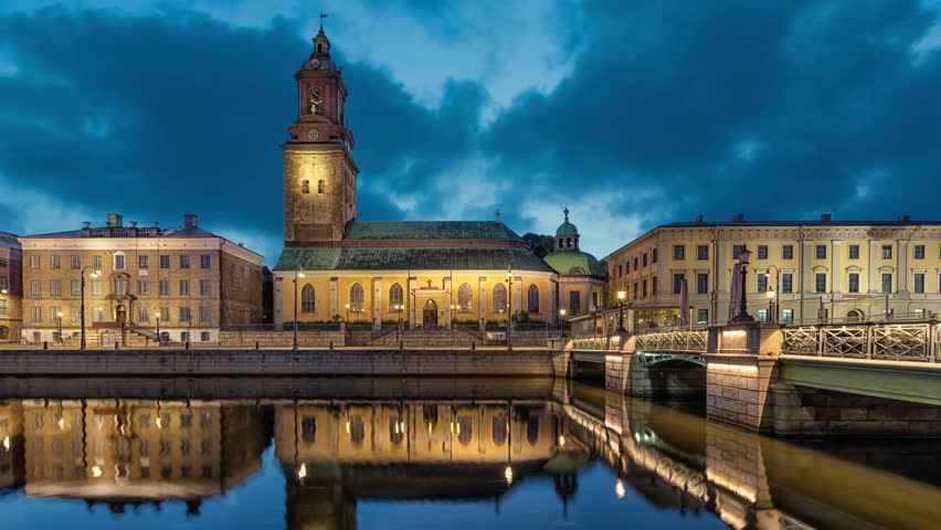 Christinae Church reflecting in water of Big Harbor Canal at dusk in Gothenburg, Sweden (static image with animated sky and water)
