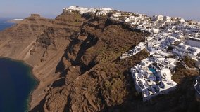 Aerial drone bird's eye view of iconic island of Santorini volcanic island with one of the best views in the world, Cyclades, Greece