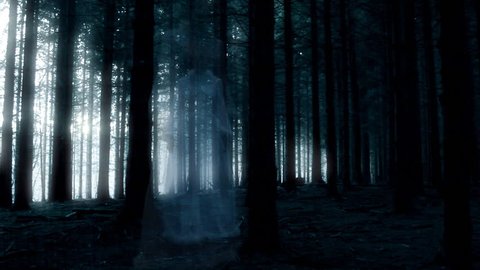 Horror or halloween movie scene: Ghost walking in the forest