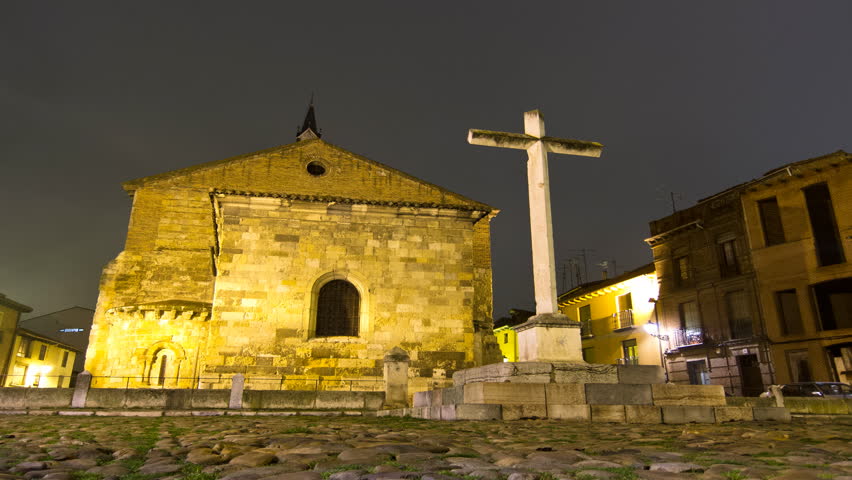 LEON, SPAIN - CIRCA 2012: Christian church and cross at night. Timelapse. Leon,