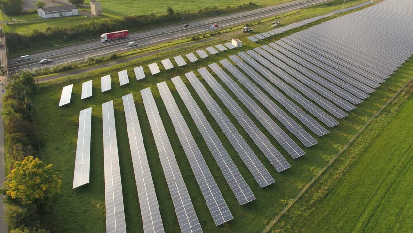 Drone Aerial moving forward above solar panels sun technology green energy 4K, a Technology Video by Flightseeing-Germany