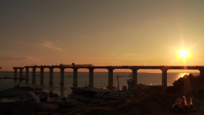 Black River bridge under construction with a sunset in the background - Manaus - Amazon - Brazil