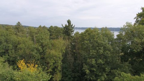 aerial from Starnberger lake drone flying above trees 4k Germany Bavaria