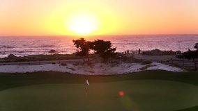 Aerial Drone Stock Video of Pebble Beach Golf Course at Sunset 