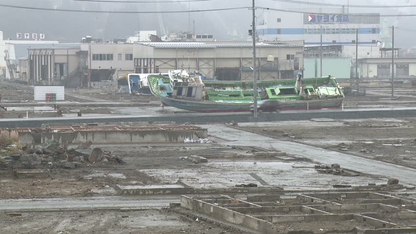 KESENNUMA, JAPAN - MARCH 2012: Japan post tsunami; Temporary Road In Devastated