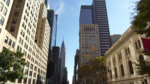 Drone establishing shot of skyscrapers buildings street in NYC New York City Manhattan