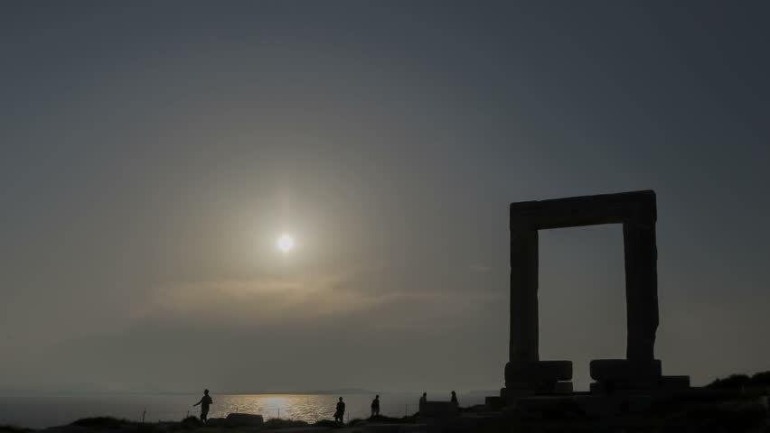 Time lapse of sunset behind the Portara gate, Naxos island, Greece during