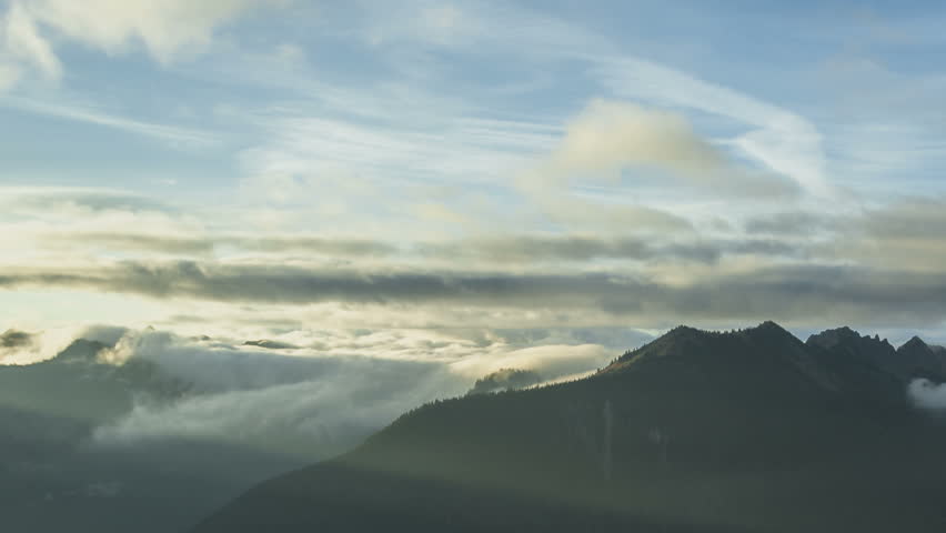 Timelapse of clouds passing the peaks at Sunrise Point of Mt Rainier National
