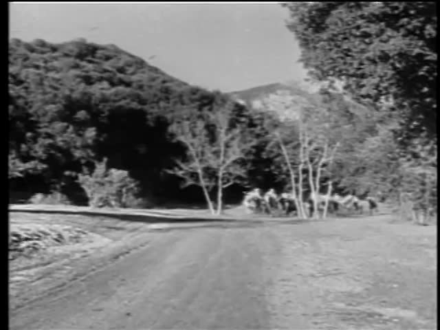 Indians on horseback on the war path