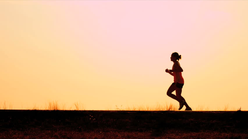 Healthy females runner work out on road sunrise shot on RED EPIC | Shutterstock HD Video #3256213