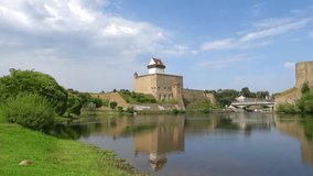 Herman's castle on the banks of the Narva river, sunny summer day. Estonia