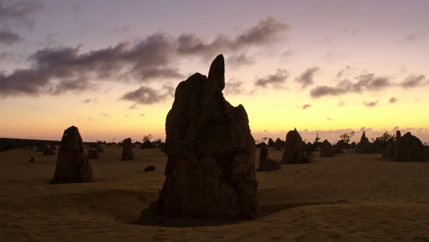 Time lapse of a silhouette of the Pinnacles at sunset, with storm clouds brewing