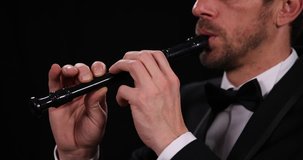Close Up Shot of Musician Flutist Man Playing Recorder Flute Classic Orchestra