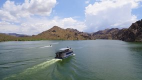 Aerial Drone Stock Video of Boats through mountains on a Desert Lake in Phoenix