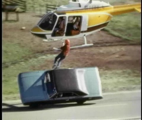 Filming helicopter and car stunt for movie