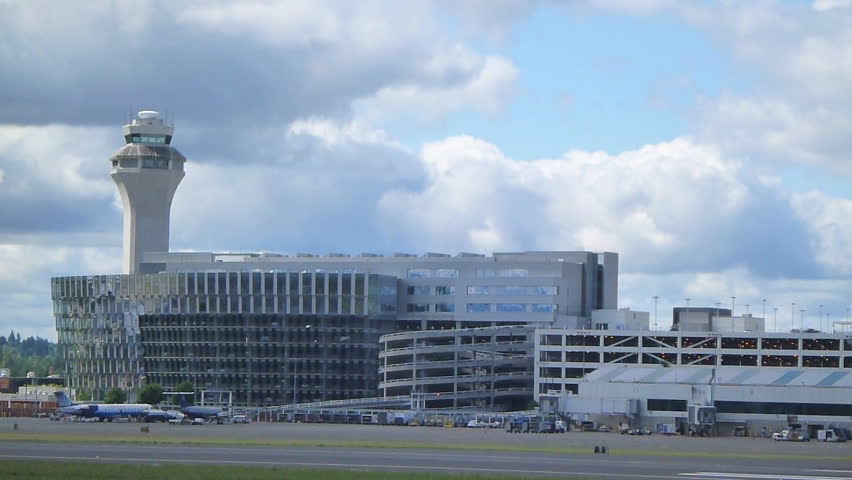 PORTLAND, OREGON AIRPORT - CIRCA 2012: Airport exterior on cloudy day with Delta