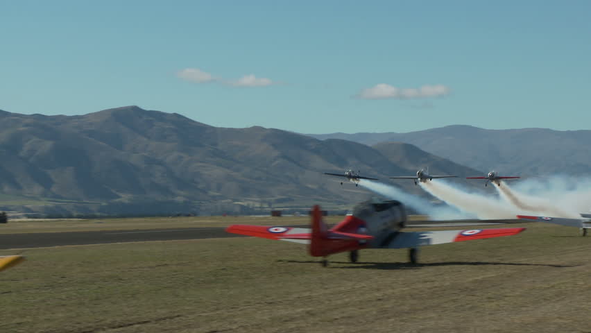 WANAKA AIRFIELD - MARCH 23: Air Team Bandits take off as a group of T6 Harvard