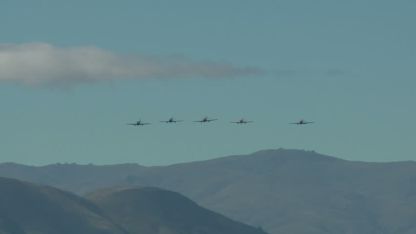 WANAKA AIRFIELD - MARCH 23: A formation flight of russian built yaks perform a